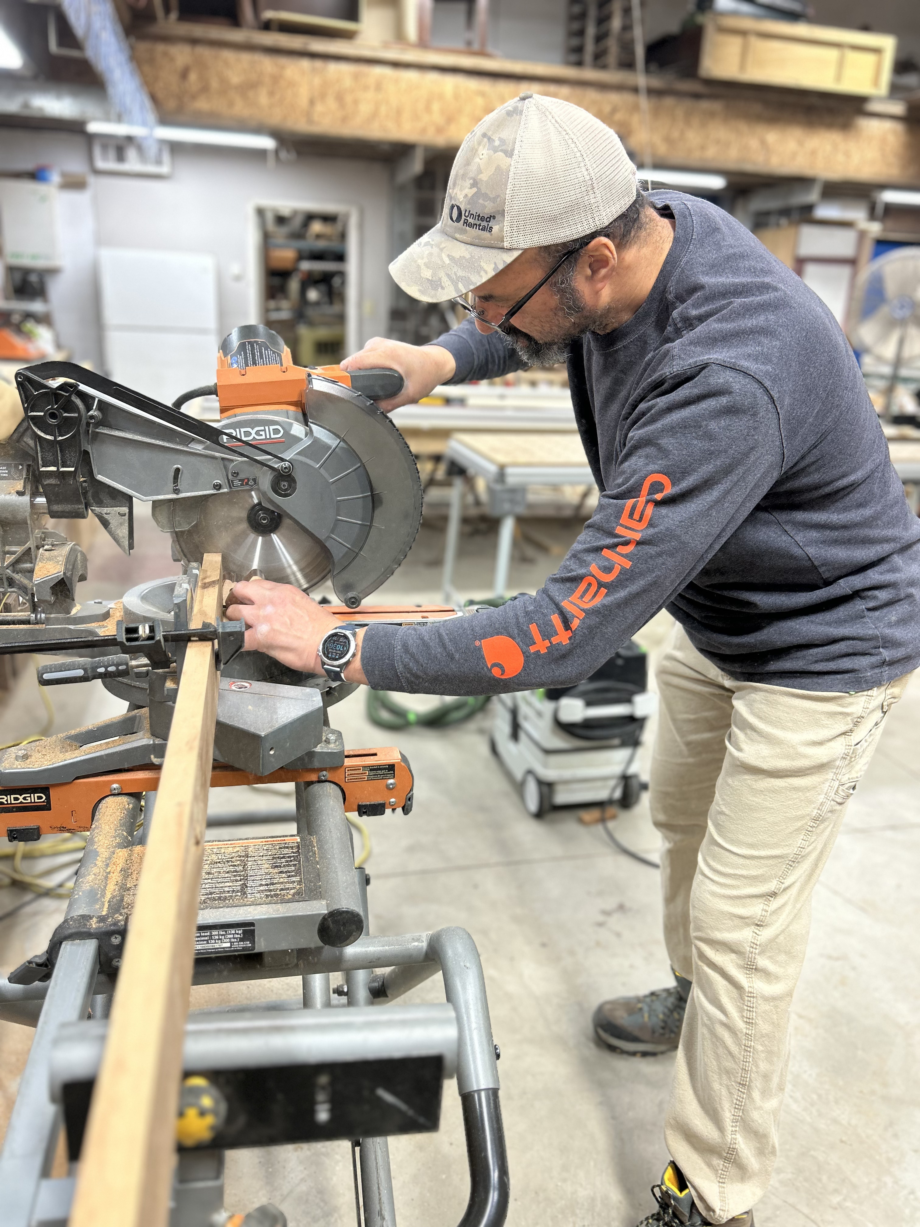Cutting timber on miter saw